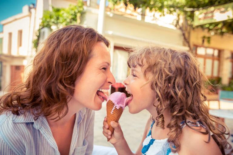 Mother,And,Child,Eating,Ice,Cream,In,Summer,Cafe,Outdoors