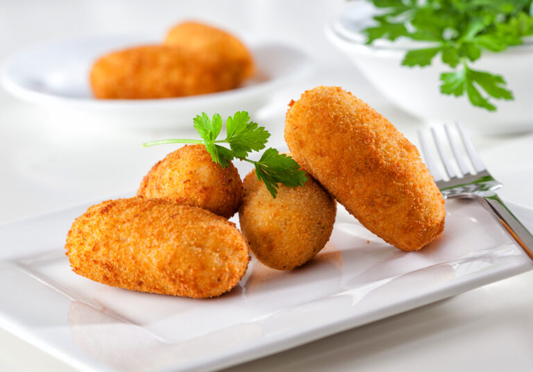 Homemade,Traditional,Spanish,Croquettes,Or,Croquetas,On,A,White,Plate